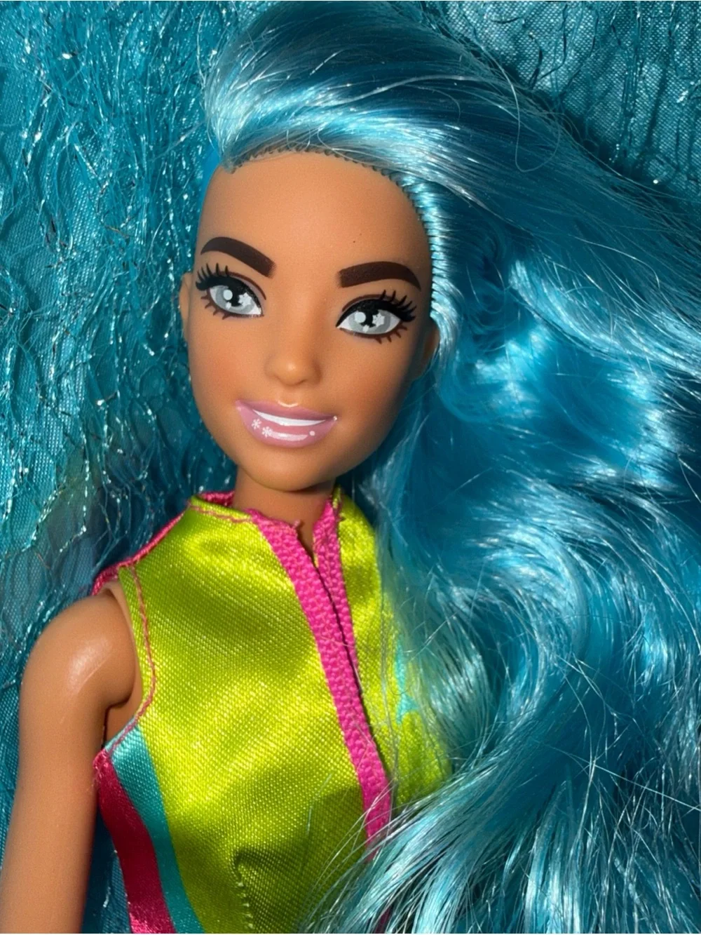 Barbie blue hair shaved head in life jacket top
